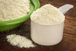 Picture of protein powder in a scoop